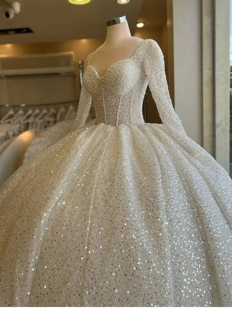 Customized 2025 Sweetheart Heavy Pearls Sequins Ballgown Wedding Dresses Robe De Mariée Illusion Full Sleeves Luxury Bridal Gown
