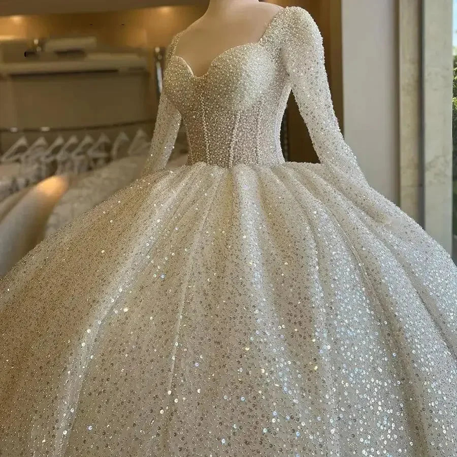 Customized 2025 Sweetheart Heavy Pearls Sequins Ballgown Wedding Dresses Robe De Mariée Illusion Full Sleeves Luxury Bridal Gown